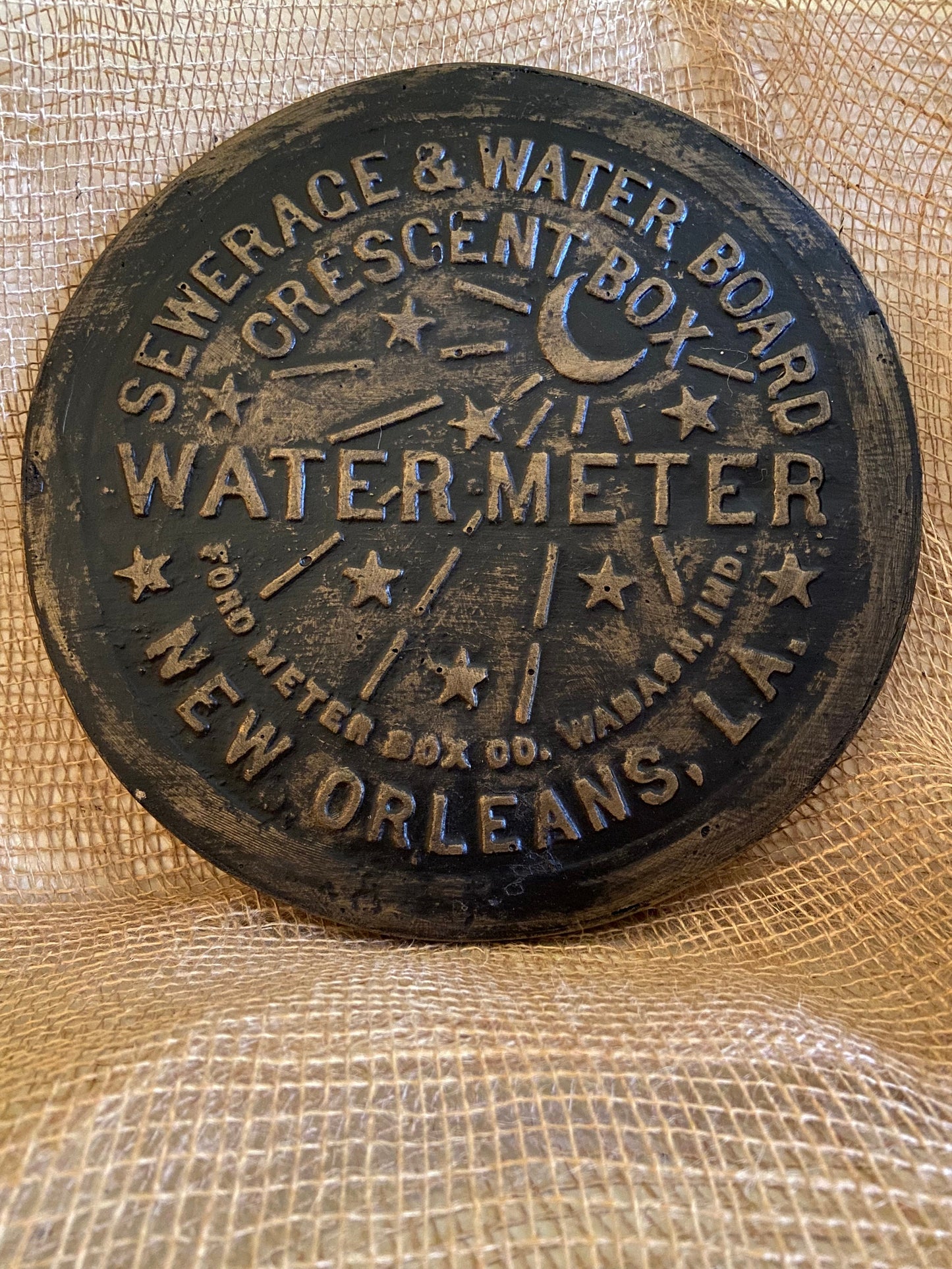 Unique wall art, famed, vintage New Orleans water meter cover