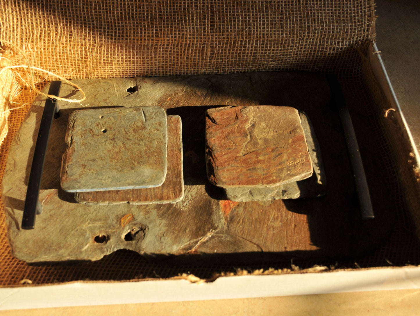 Beautiful vintage roofing slate crafted into a serving or decorative tray with four matching coasters. Stylish handles compliment this piece