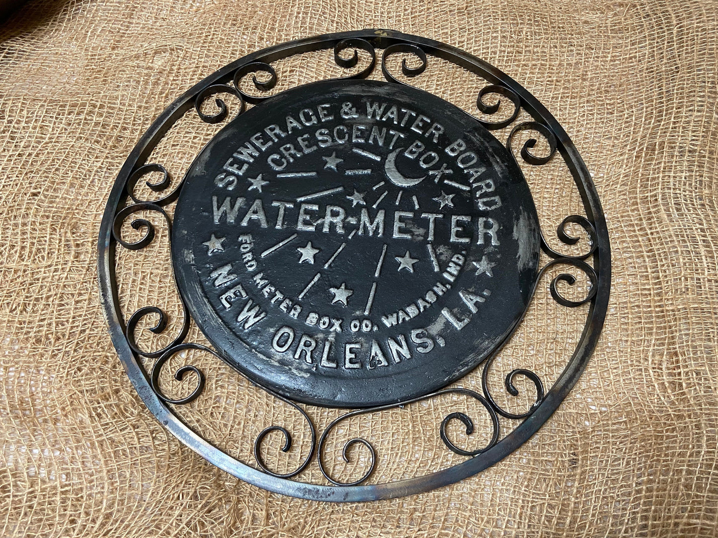 Replica New Orleans water meter cover with hand made Iron lace work