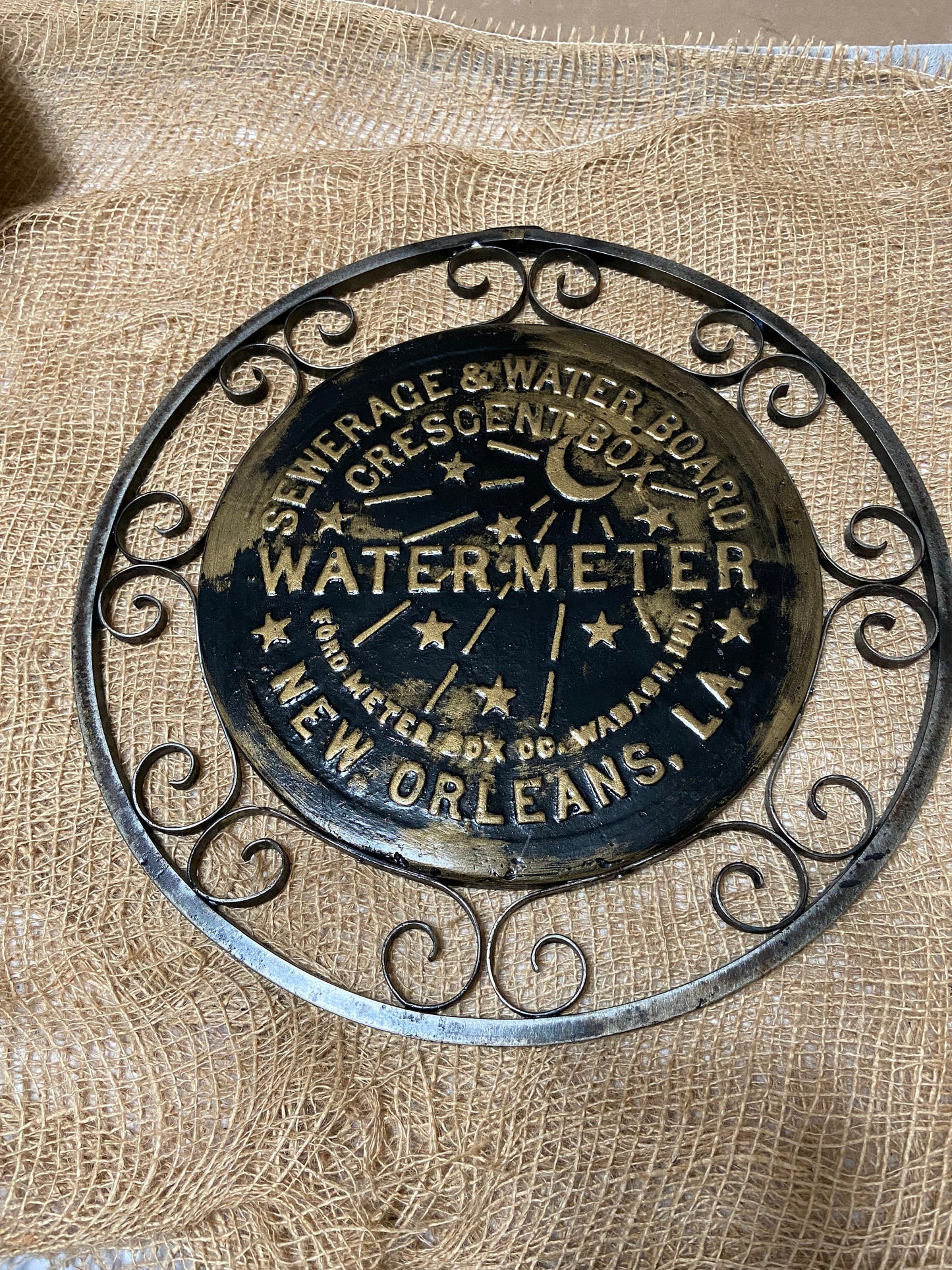 Replica New Orleans water meter cover with hand made Iron lace work