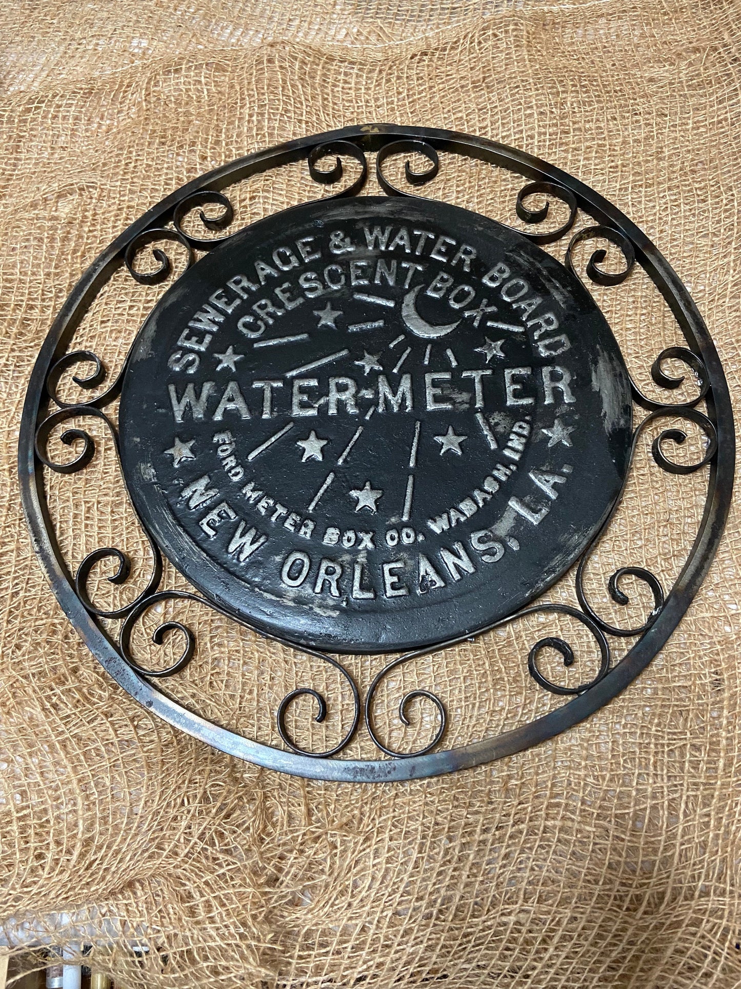 Replica New Orleans water meter cover with hand made Iron lace work