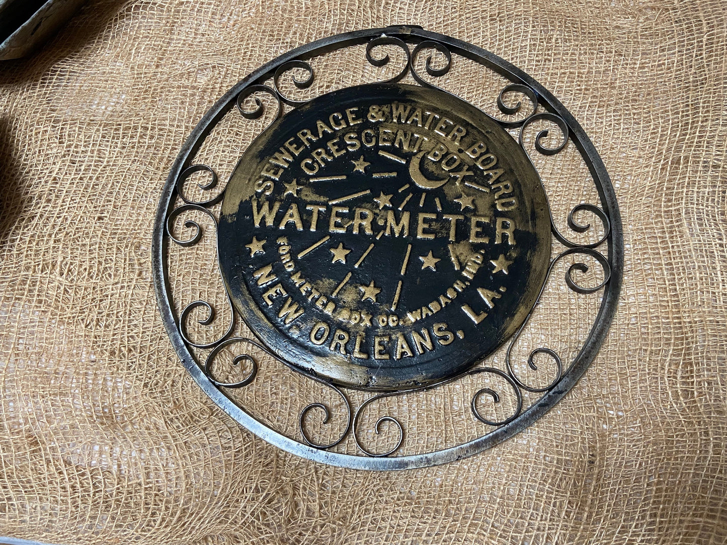 Replica New Orleans water meter cover with hand made Iron lace work