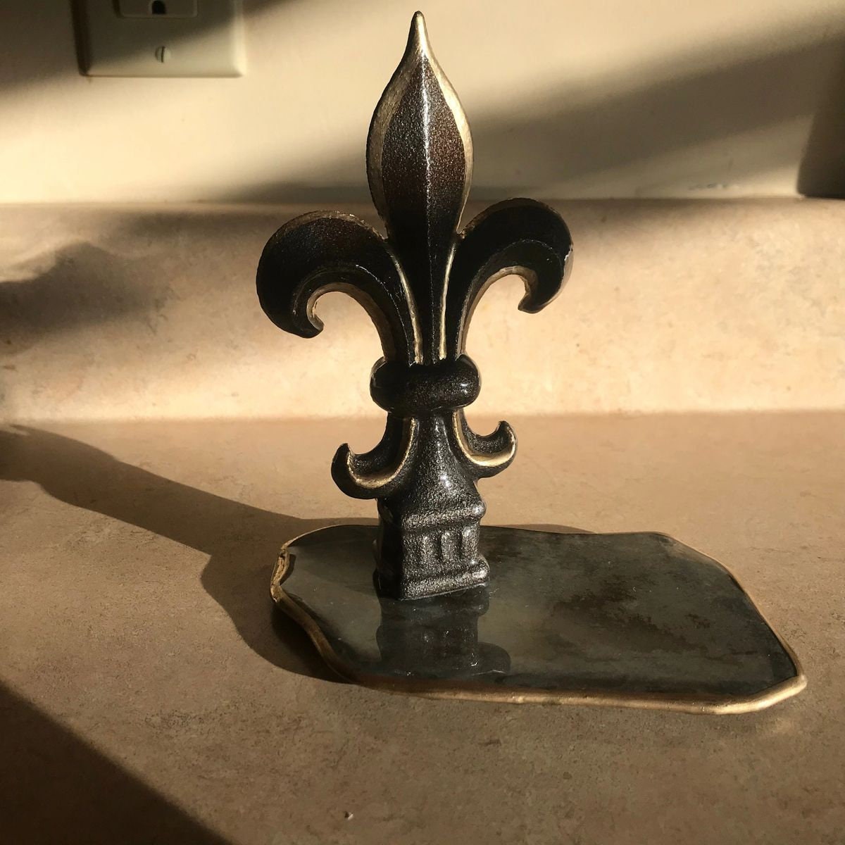 Hand painted cast iron Fleur de Lis mounted on vintage weathered slate, sealed with high gloss clear epoxy finish