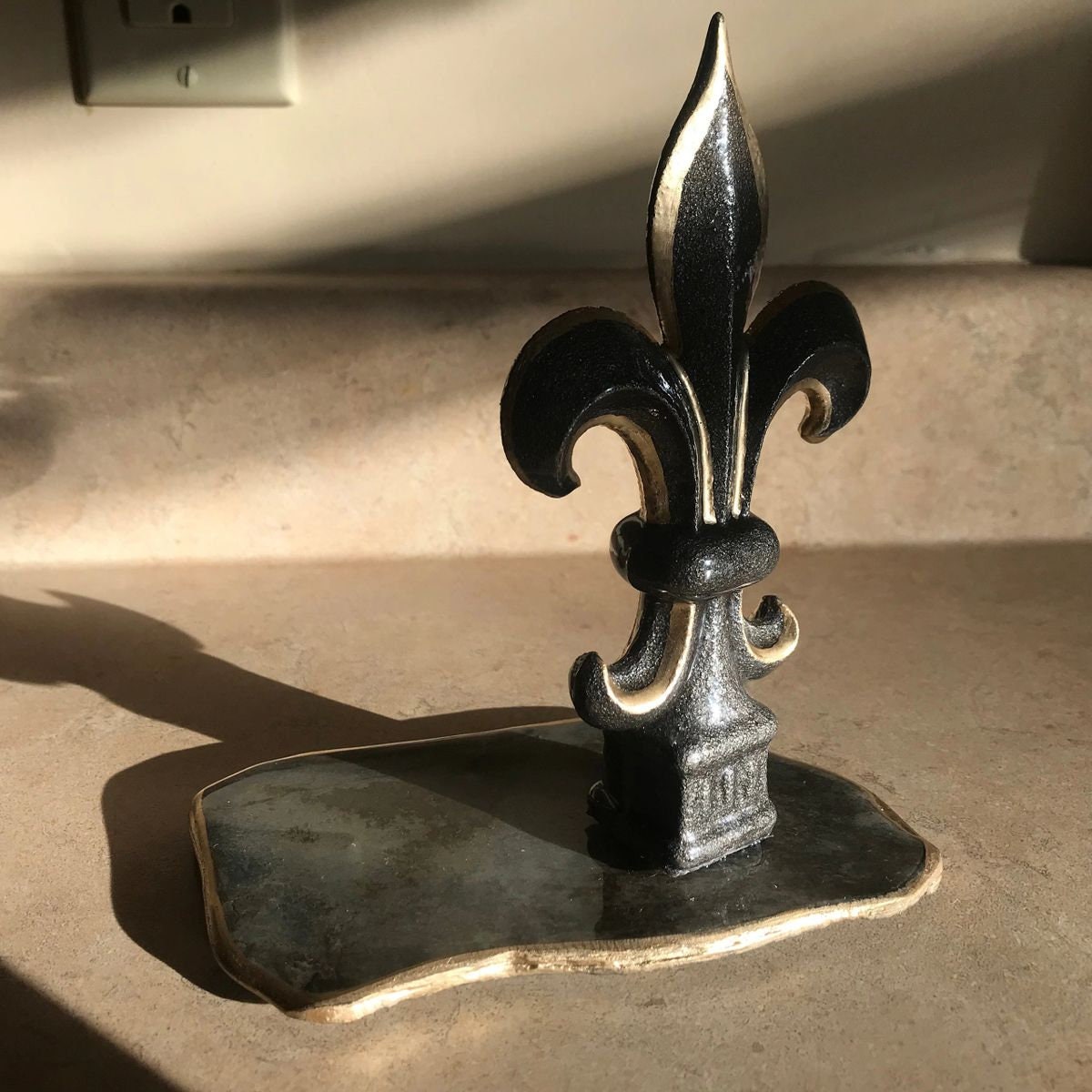 Hand painted cast iron Fleur de Lis mounted on vintage weathered slate, sealed with high gloss clear epoxy finish