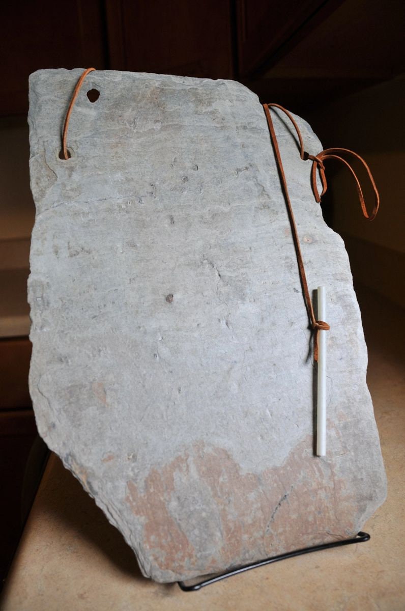 Vintage, weathered slate chalkboard with three soapstone pencils, leather strung for wall hanging. Makes a unique gift.