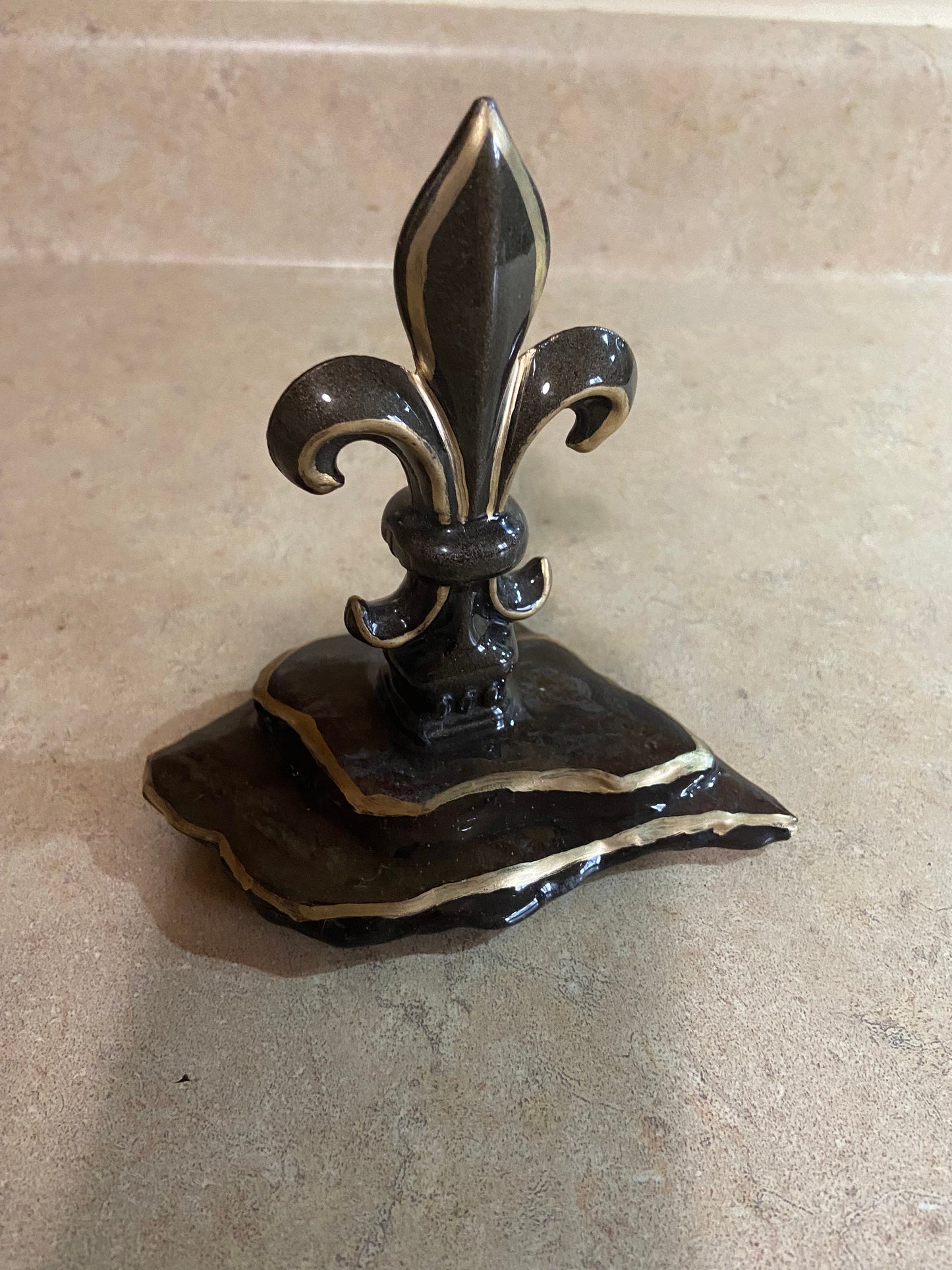 Hand painted cast iron Fleur de Lis mounted on vintage weathered slate, sealed with high gloss clear epoxy finish