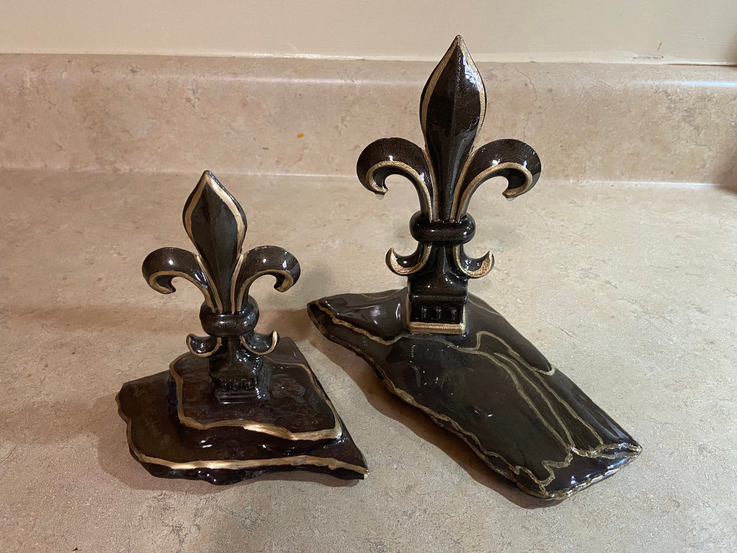 Hand painted cast iron Fleur de Lis mounted on vintage weathered slate, sealed with high gloss clear epoxy finish