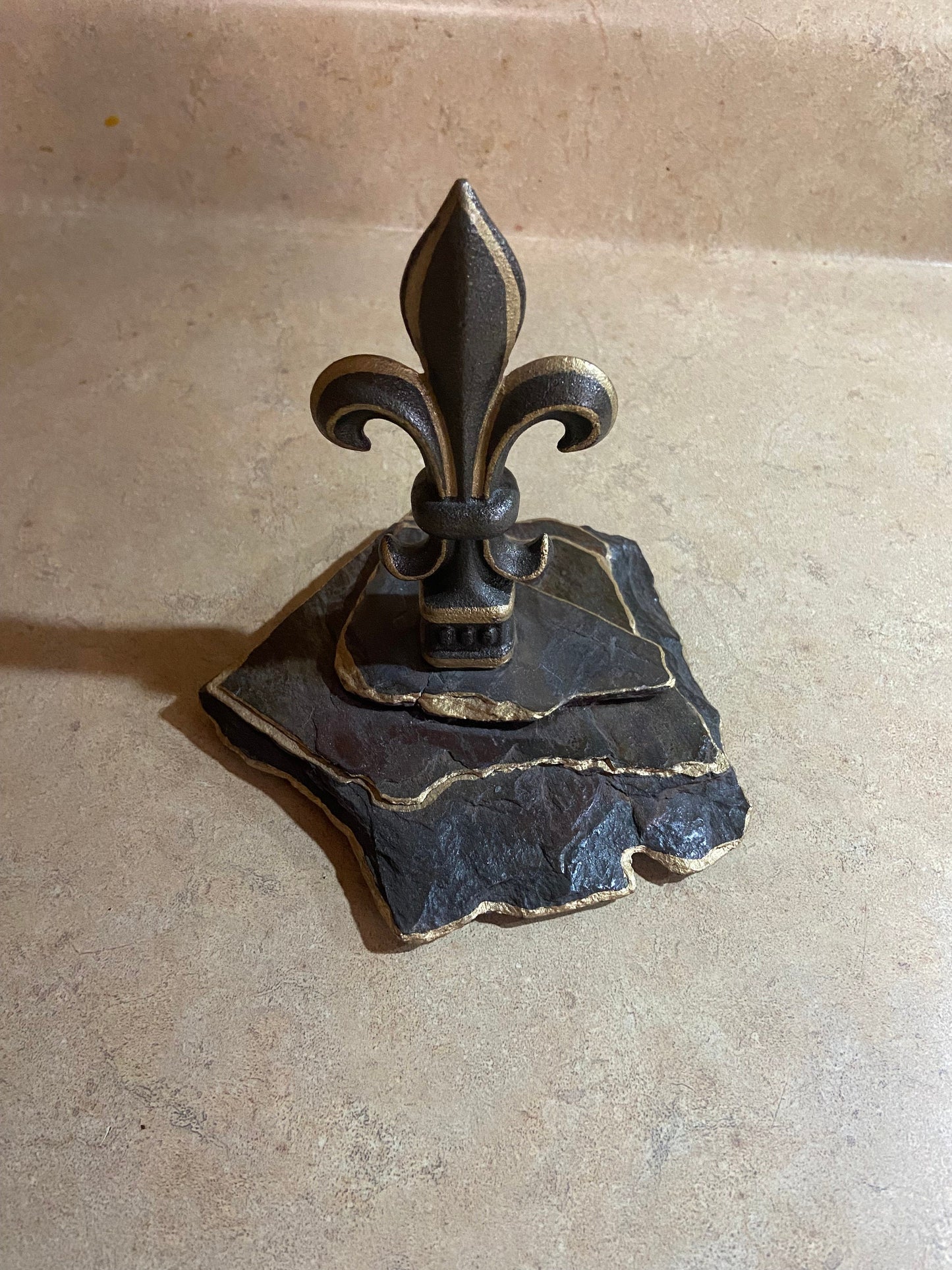 Hand painted cast iron Fleur de Lis mounted on vintage weathered slate, sealed with high gloss clear epoxy finish