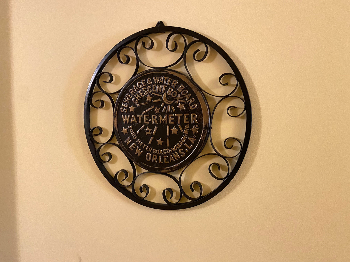 Replica New Orleans water meter cover with hand made Iron lace work